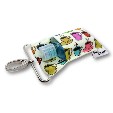 Coffee design hand sanitizer holder with silver clip.