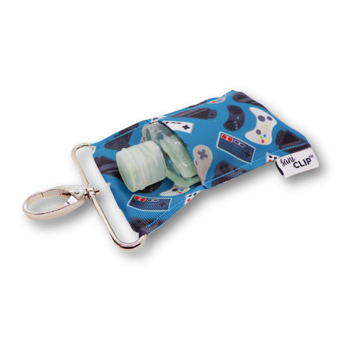 Computer gaming blue hand sanitizer holder with silver clip.