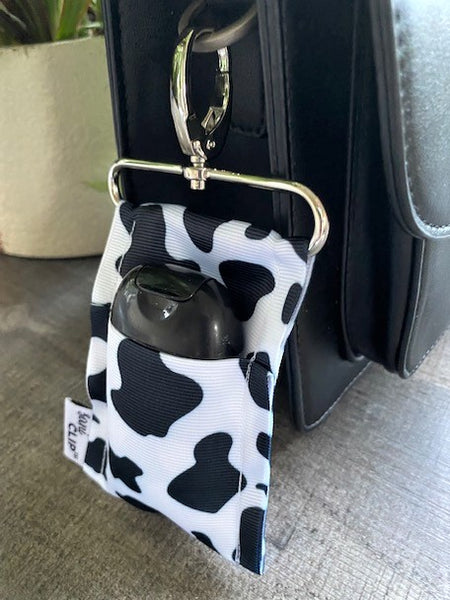 Cow Print SaniClip™ | Mini Hand Sanitizer Holder